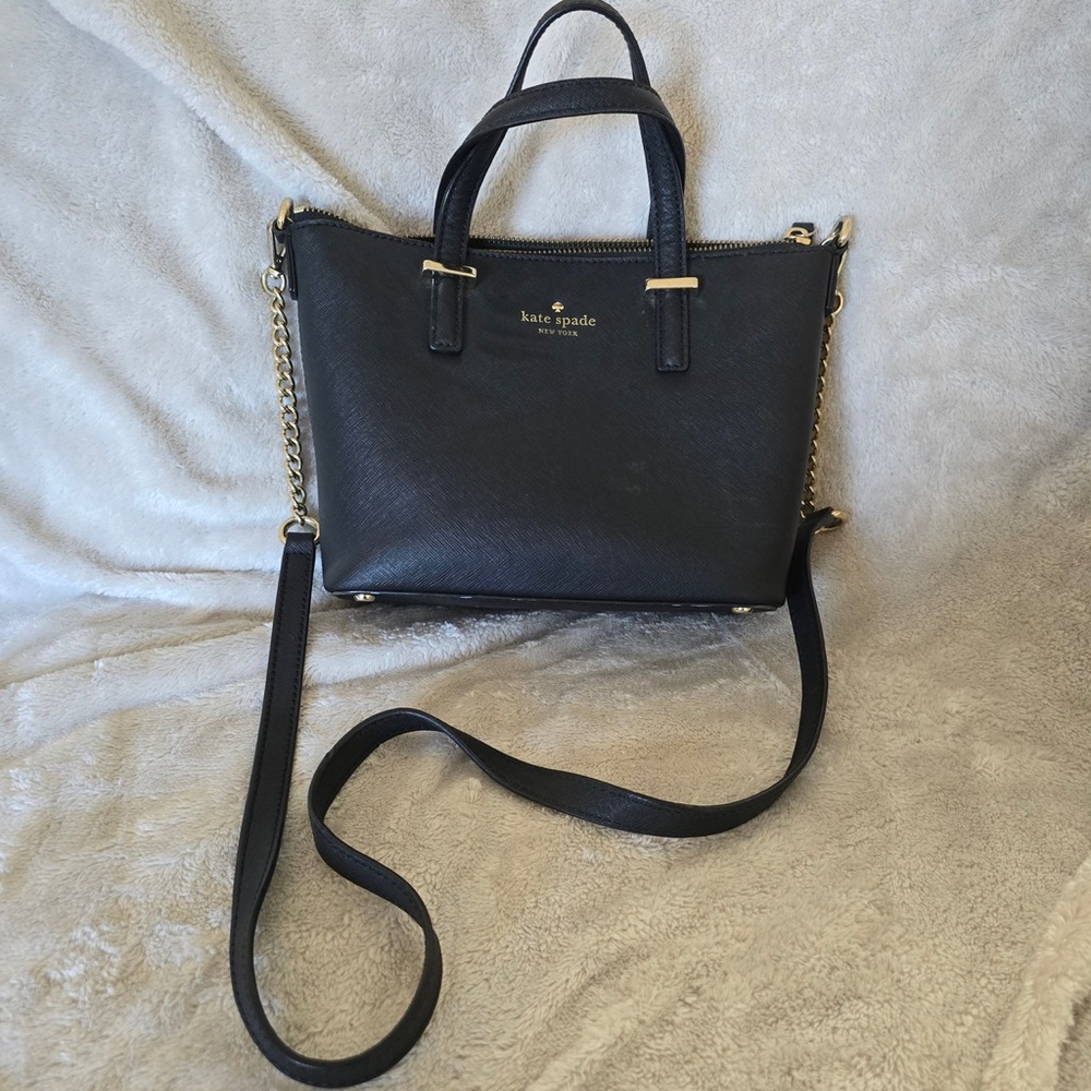 Kate Spade black small purse with straps for crossbody.